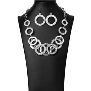 NWT the Kelia. Beautiful necklace with rhinestones & matching earrings.